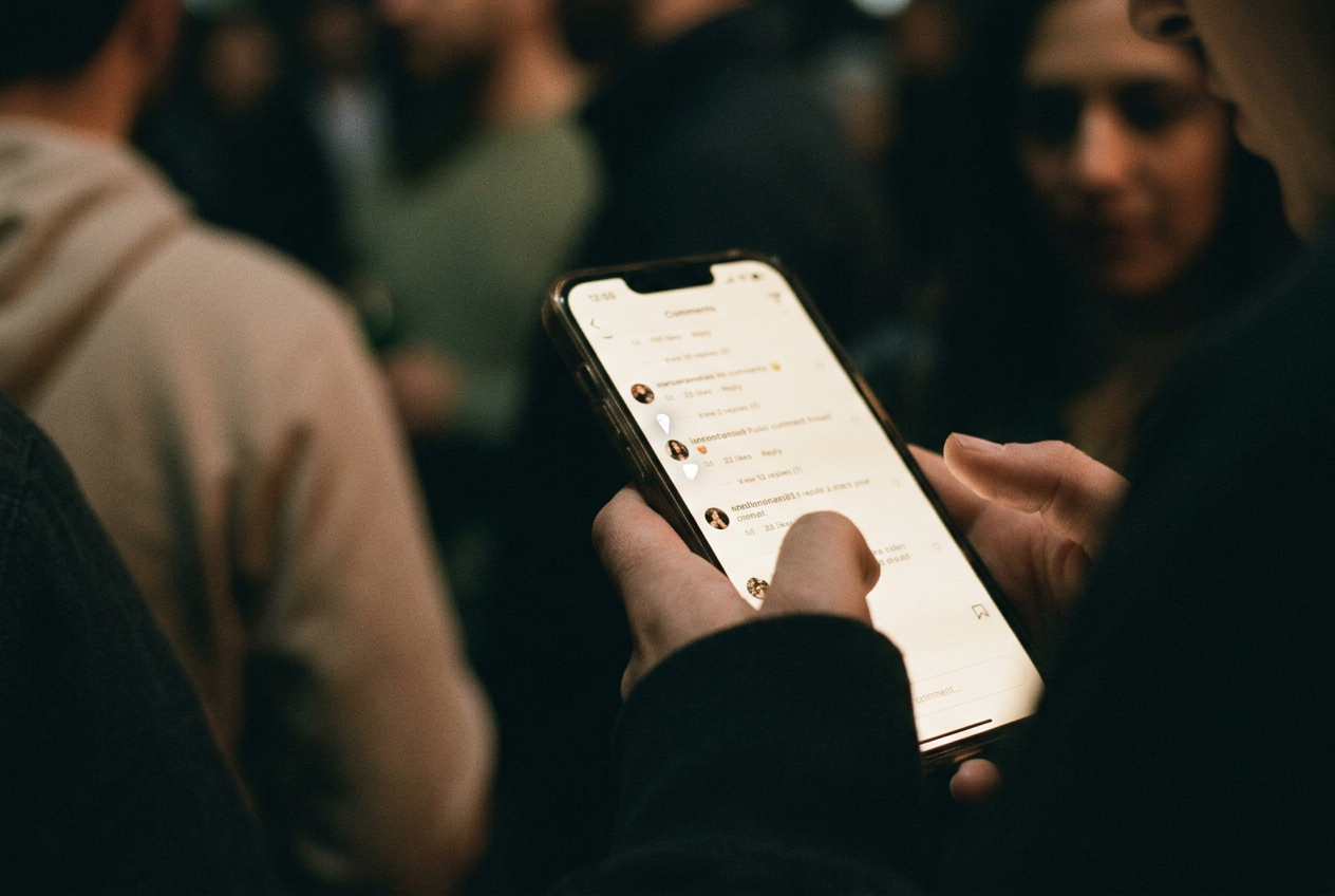 Close view of an Instagram Reel comment thread with a pinned comment marker visible beneath the post.